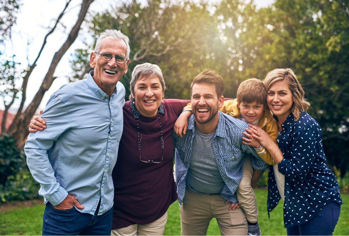 Happy family together, representing hope and everyday life after treatment