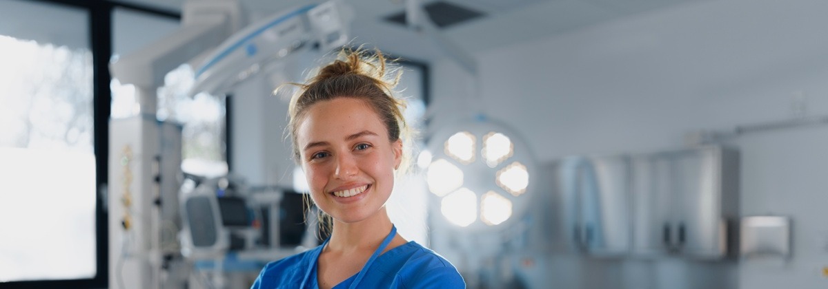 Nurse in a modern operating room, representing the controlled hospital environment where PAMO is performed